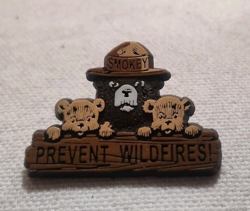 Smokey bear with - with, cubs